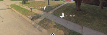 The sidewalk from the front door to the mail box was often used as a dividing line in lawn games.